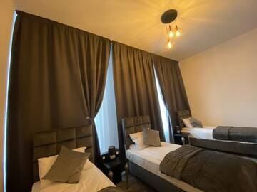 Фото номера Трехместный номер Отель Hotel Bellavista Deta г. Deta 5
