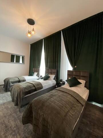 Фото номера Трехместный номер Отель Hotel Bellavista Deta г. Deta 6